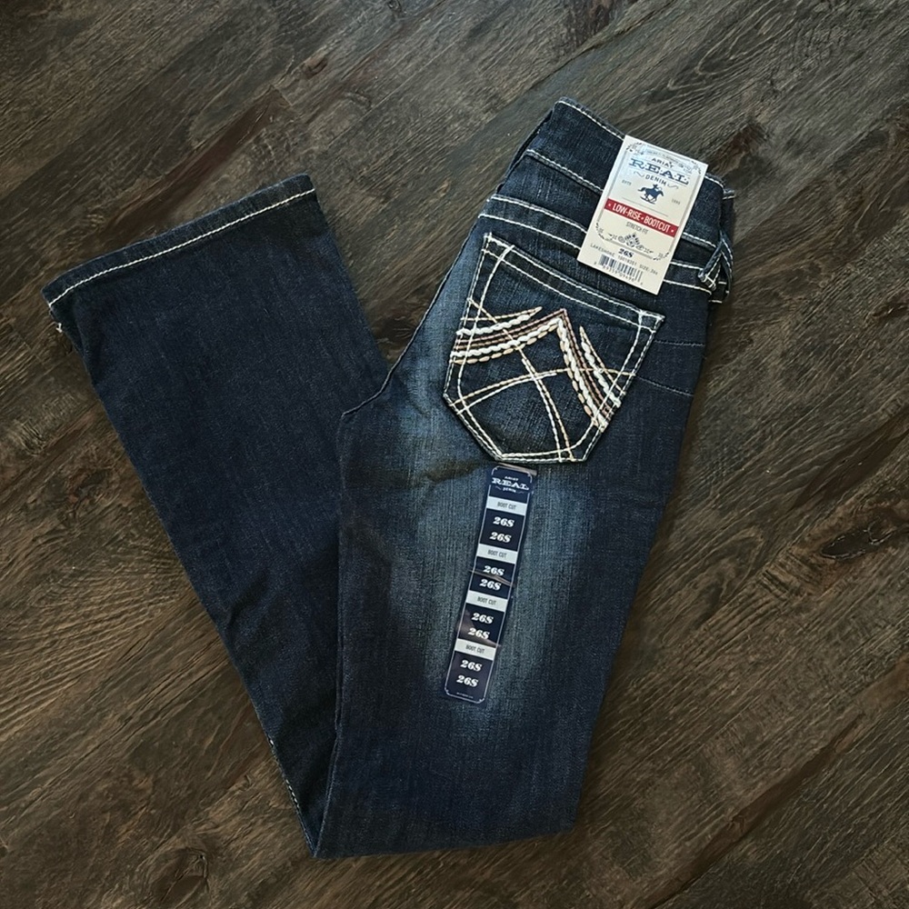 R.E.A.L. Low Rise Stretch Rosy Whipstitch Boot Cut Jean